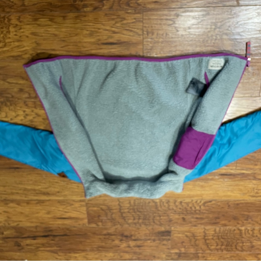 Used girls small Burton reversible fleece jacket.